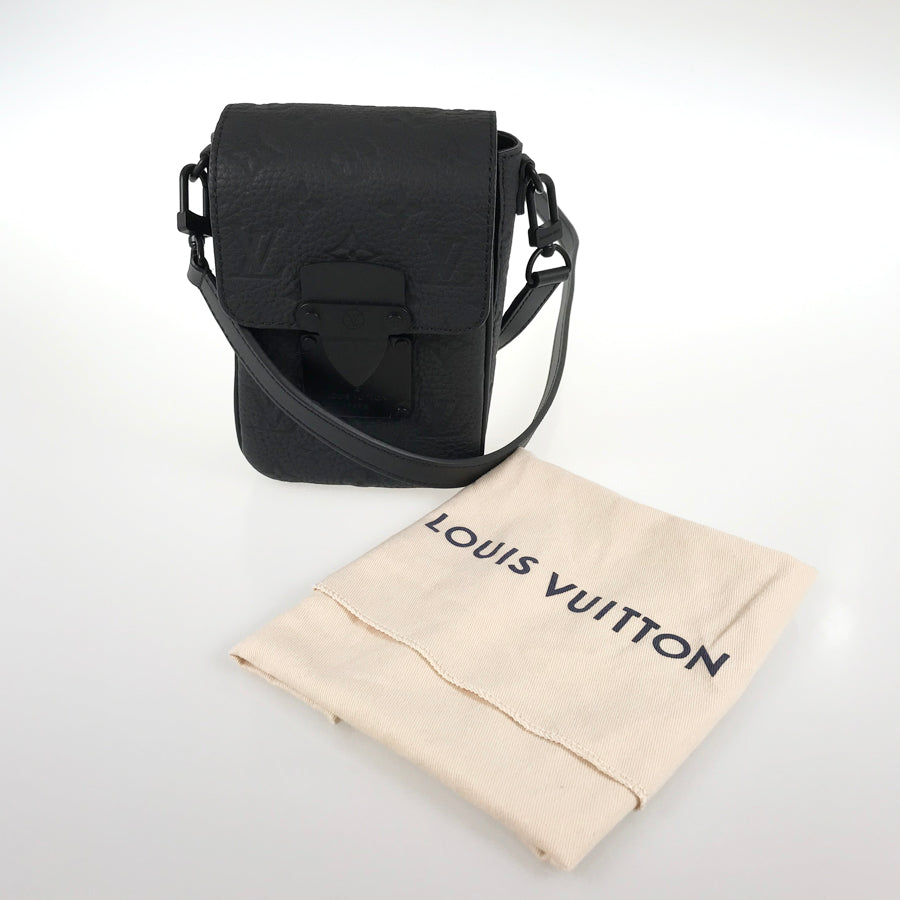 LOUIS VUITTON Taurillon Leather S Lock Vertical Wearable Wallet