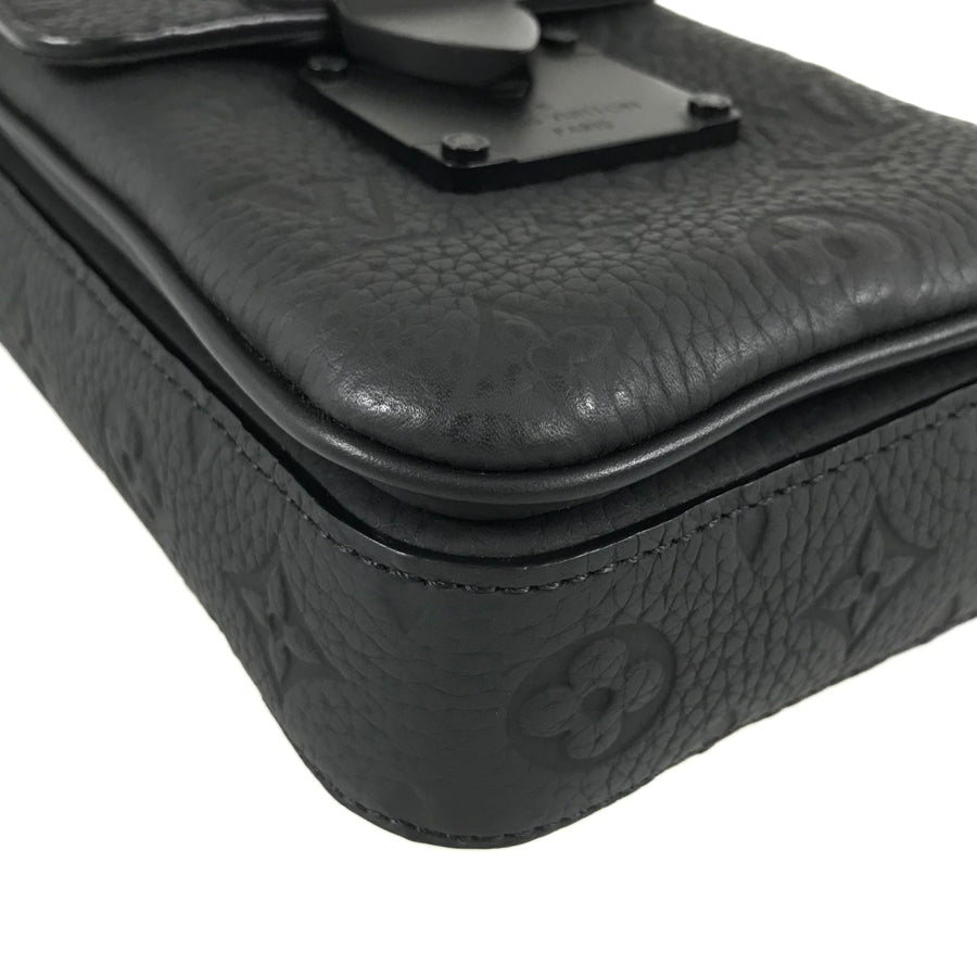 LOUIS VUITTON Taurillon Leather S Lock Vertical Wearable Wallet