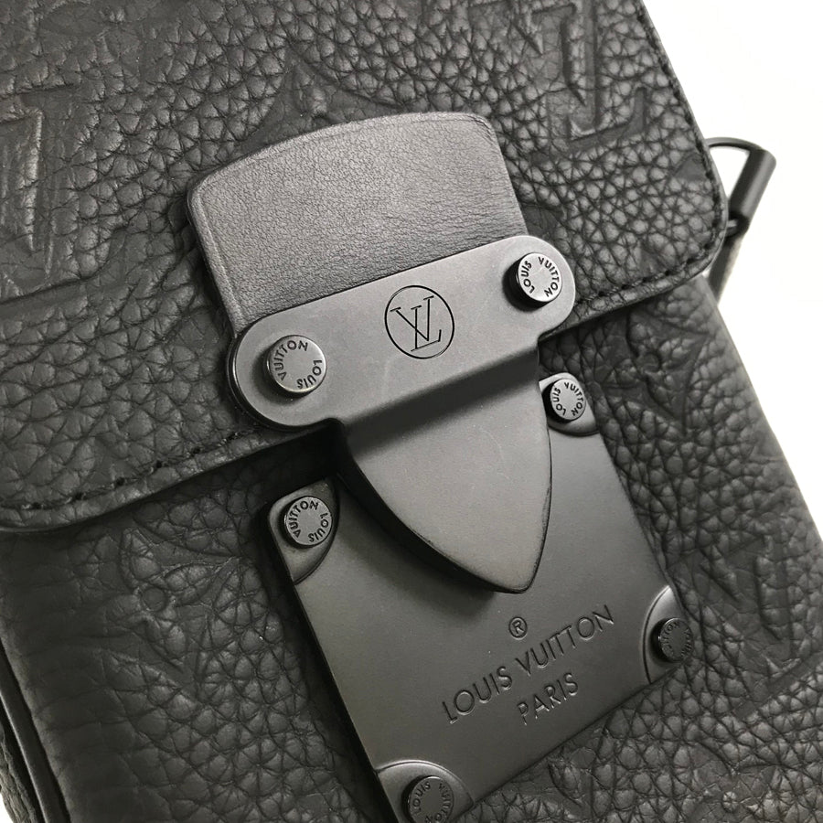 LOUIS VUITTON Taurillon Leather S Lock Vertical Wearable Wallet