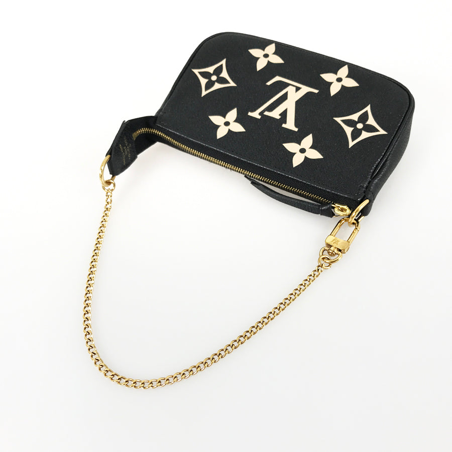 LOUIS VUITTON エピレザー シリンダー型ミニポーチ Louis Vuitton Lizard Mini Twist Crystal Embellished Black Shoulder
