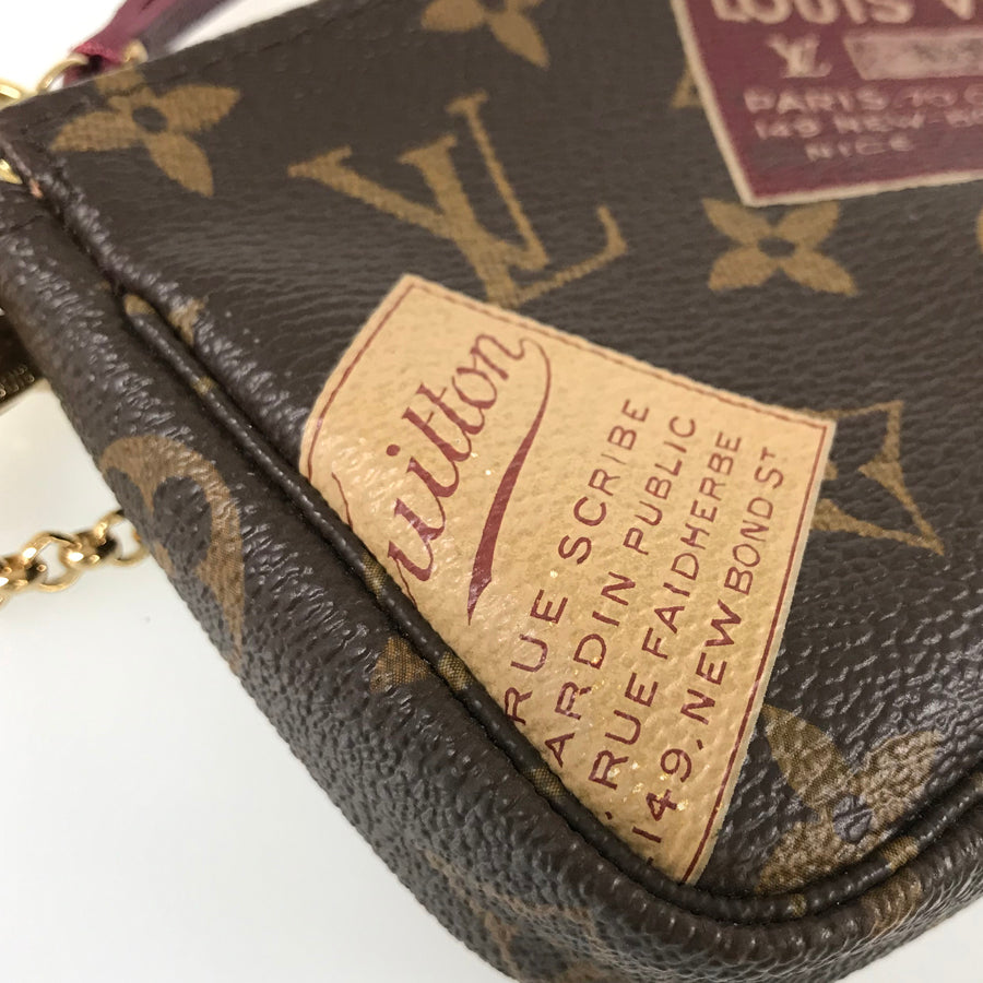 LOUIS VUITTON Monogram Mini Pochette Accessoires travel collection