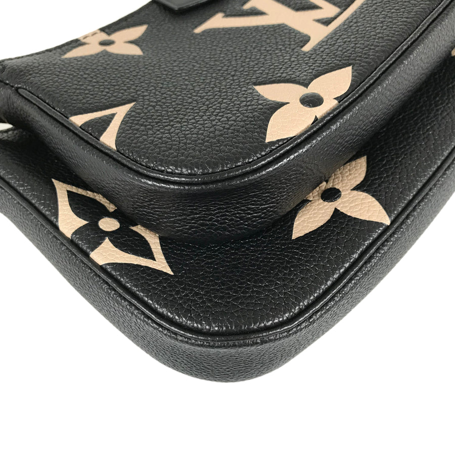 LOUIS VUITTON Monogram Empreinte Bicolor Multi Pochette