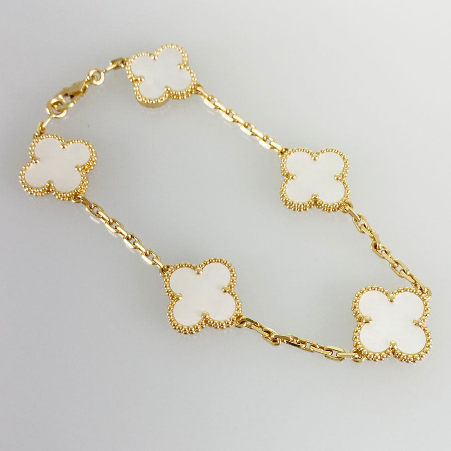 Lucky Spring bracelet, 5 motifs 18K rose gold, Carnelian, Mother-of-pearl,  Onyx- Van Cleef & Arpels